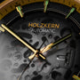 "Flowfinder", a men's automatic watch, features a captivating maplewood and gold design.