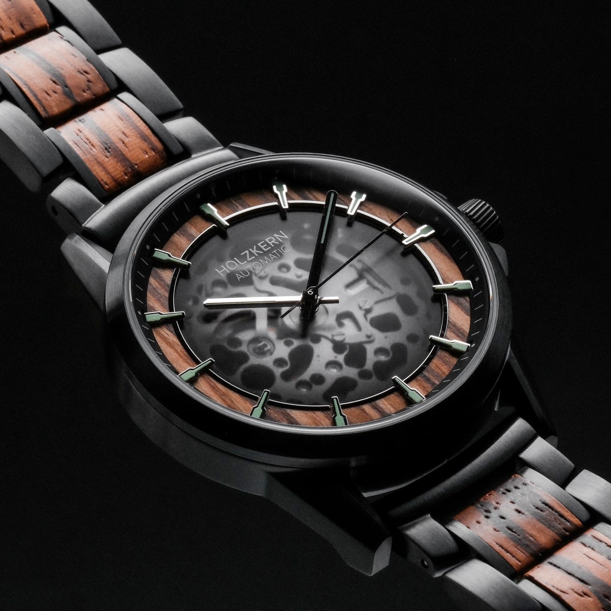 "Flowfinder" watch, featuring a zebrawood and black design with a sleek, modern style.