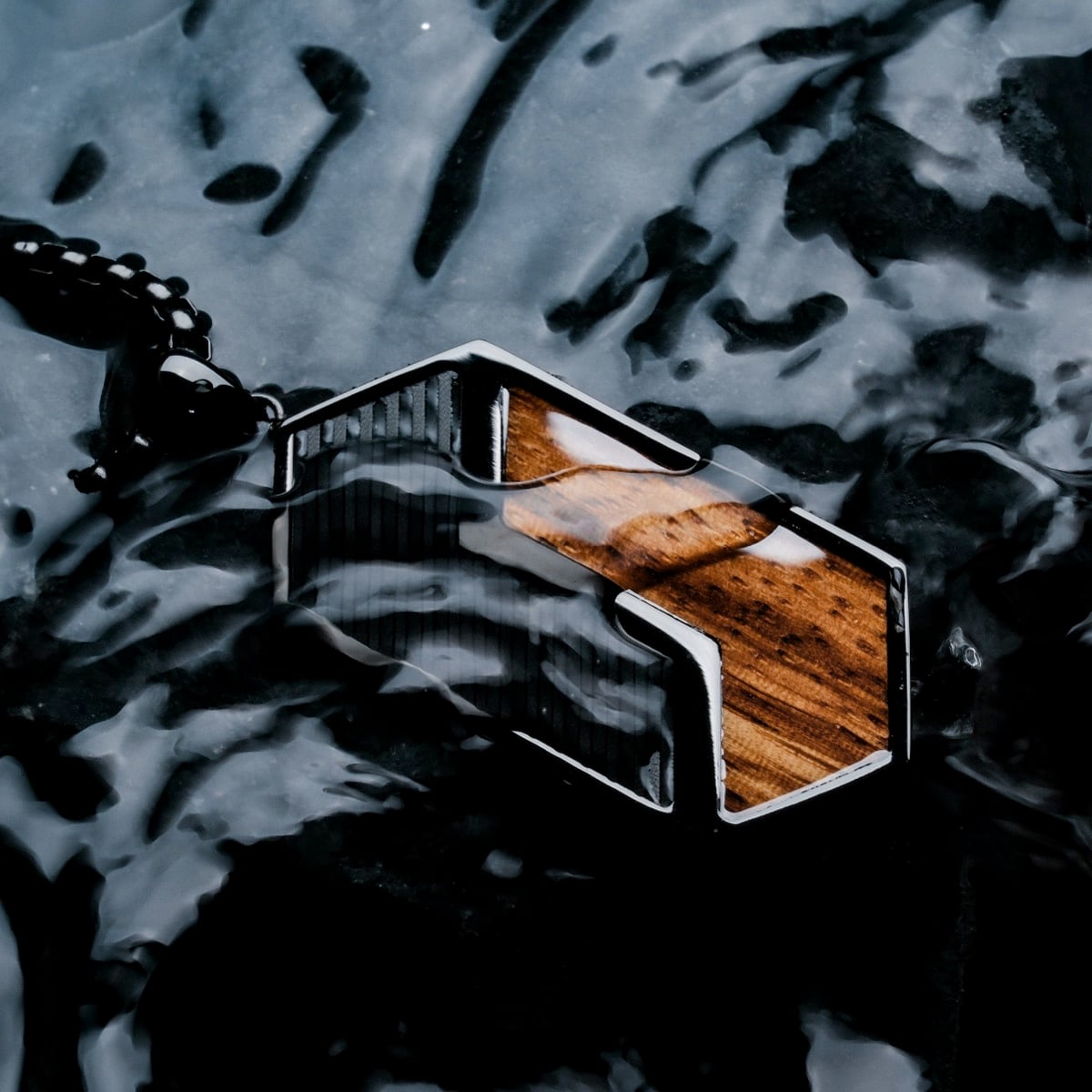 "Zigzag Necklace", an edgy necklace featuring zebrawood with a striking black zigzag pattern.