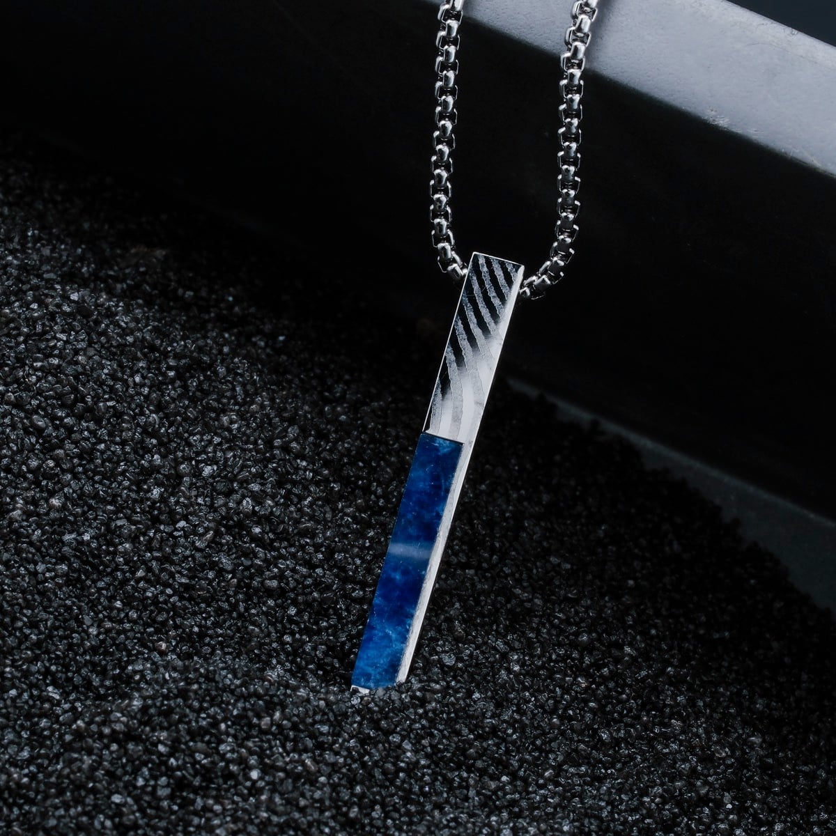 "Campania Necklace", a stylish necklace featuring sodalite and Damascus design, displayed with a chic and elegant aesthetic.