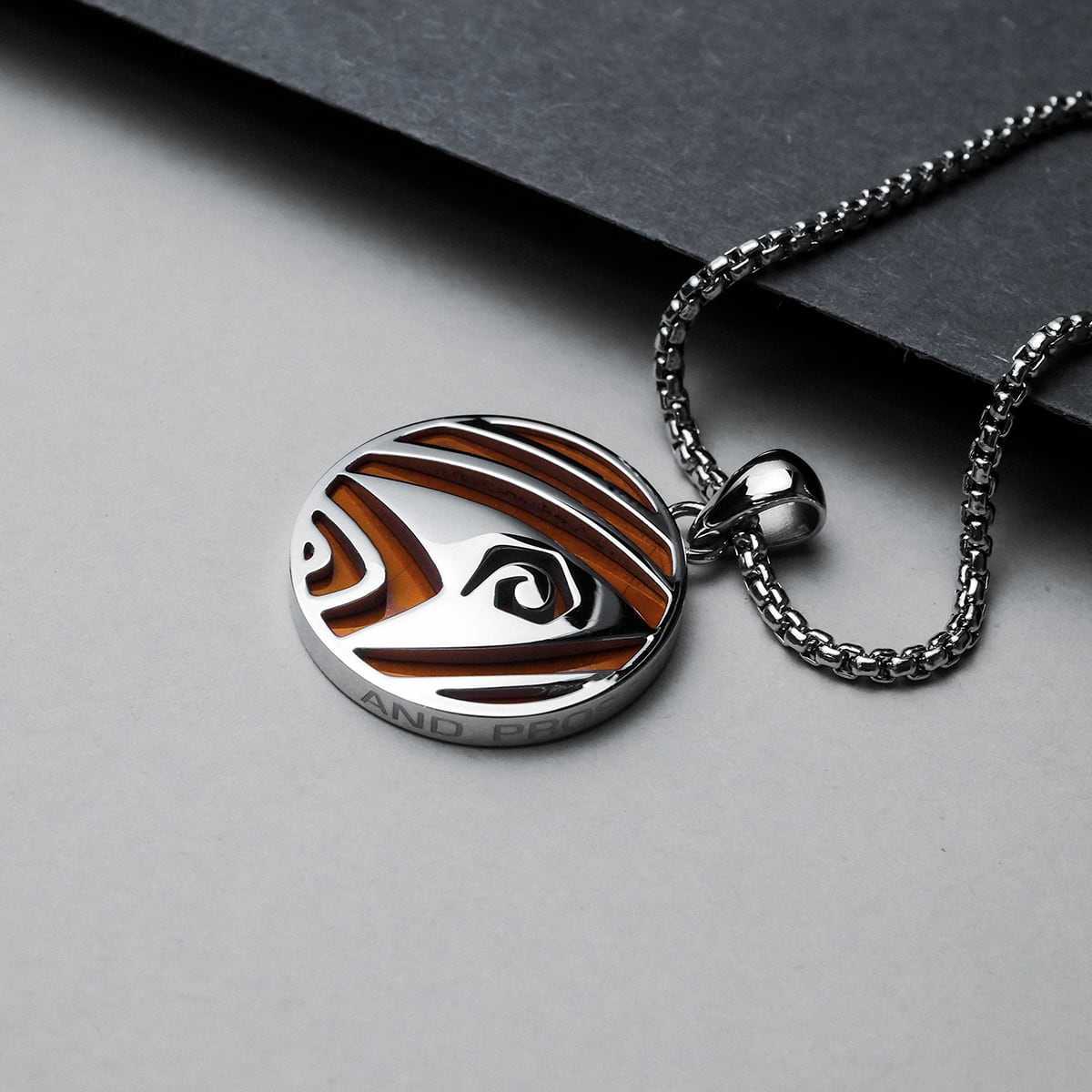 "Operations Necklace" necklace, featuring a round jasper and silver design with an elegant modern style.