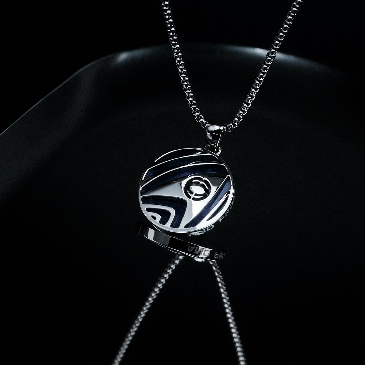"Sciences Necklace", a silver sodalite necklace with a sleek, modern design.