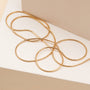 "Charms Bracelet" - Elegant gold charm bracelet with a minimalist design.