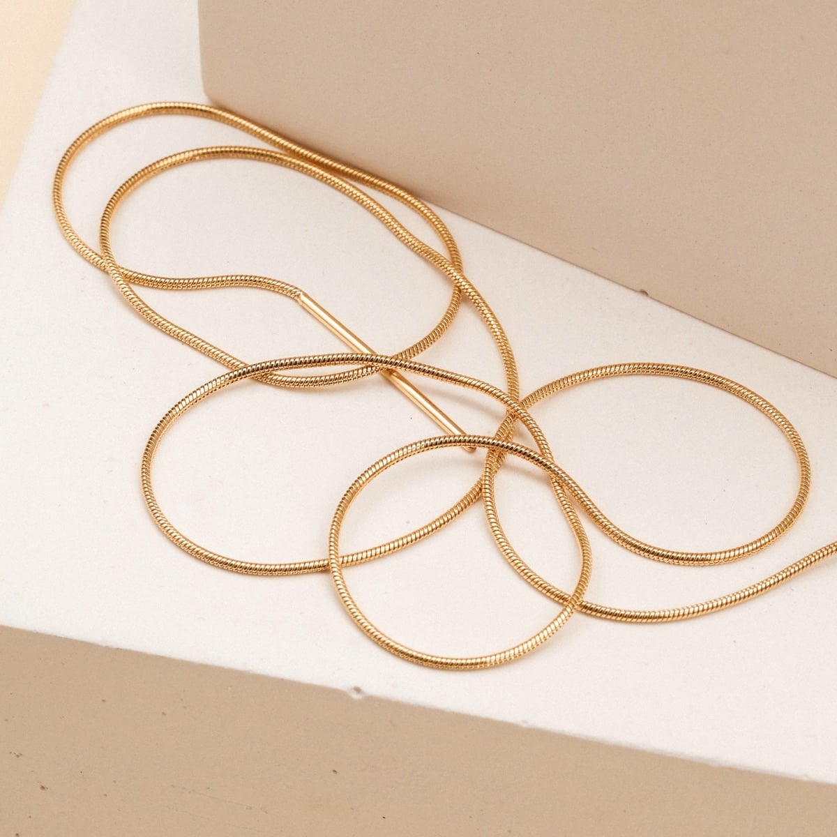 "Charms Bracelet" - Elegant gold charm bracelet with a minimalist design.