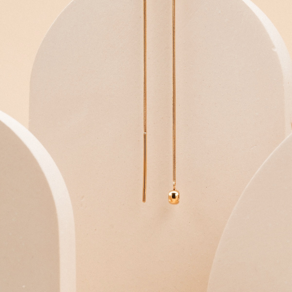 Elegant "Charms Bracelet" bracelet with a delicate gold style and minimalist charm design.