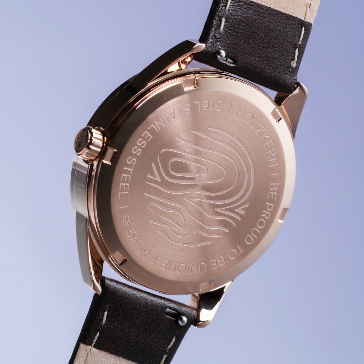 "Gifted" watch, featuring a sophisticated walnut and dark brown style with engraved stainless steel back.