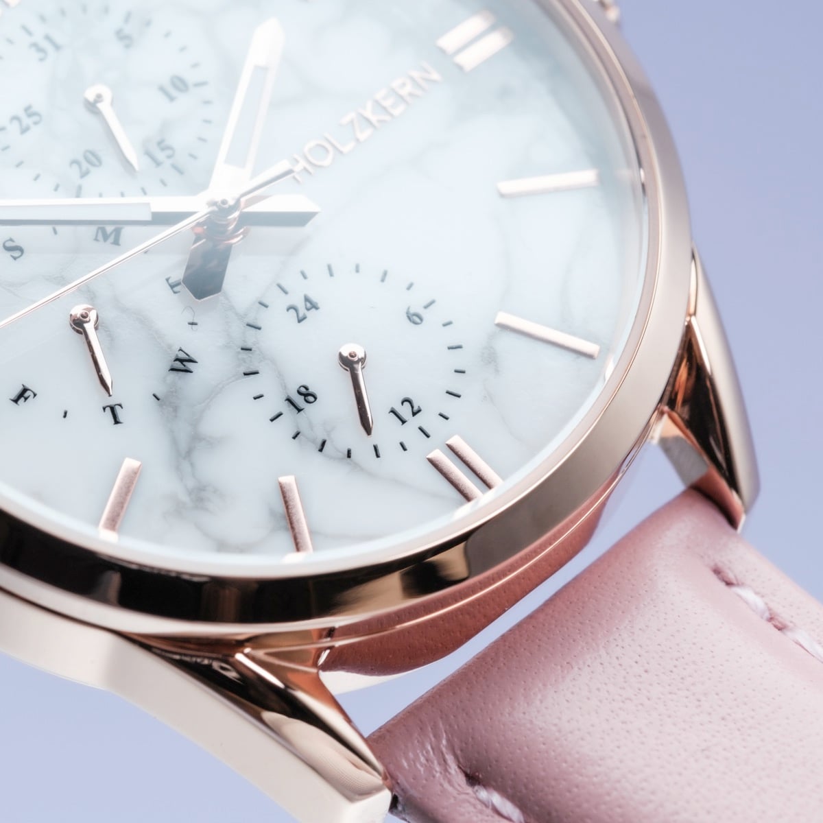 "Gifted" watch featuring a howlite dial and pink leather strap with an elegant and modern style.