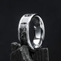 Sumo Ring - A tungsten ring with a meteorite inlay, featuring a faceted, reflective design on a dark background.