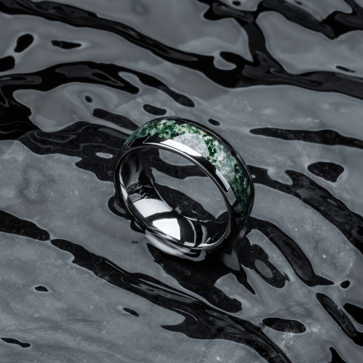 "Sumo Ring", a stylish ring crafted from agate and tungsten, showcased with a sleek and modern aesthetic.