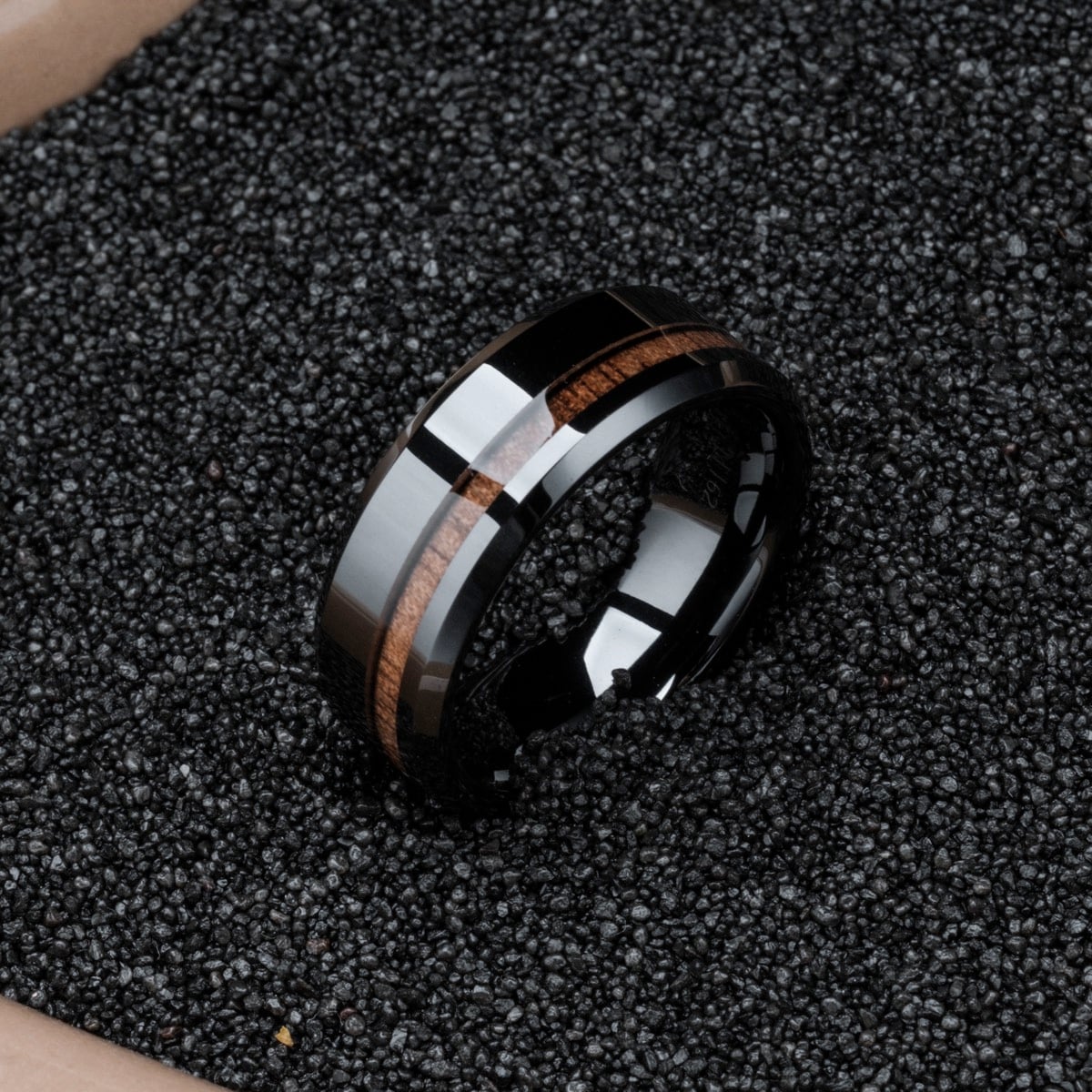 "Sumo Ring": Elegant walnut and ceramic ring featuring a sleek, modern design.