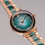 "Sunglister" watch with green mother-of-pearl dial and rose gold accents.