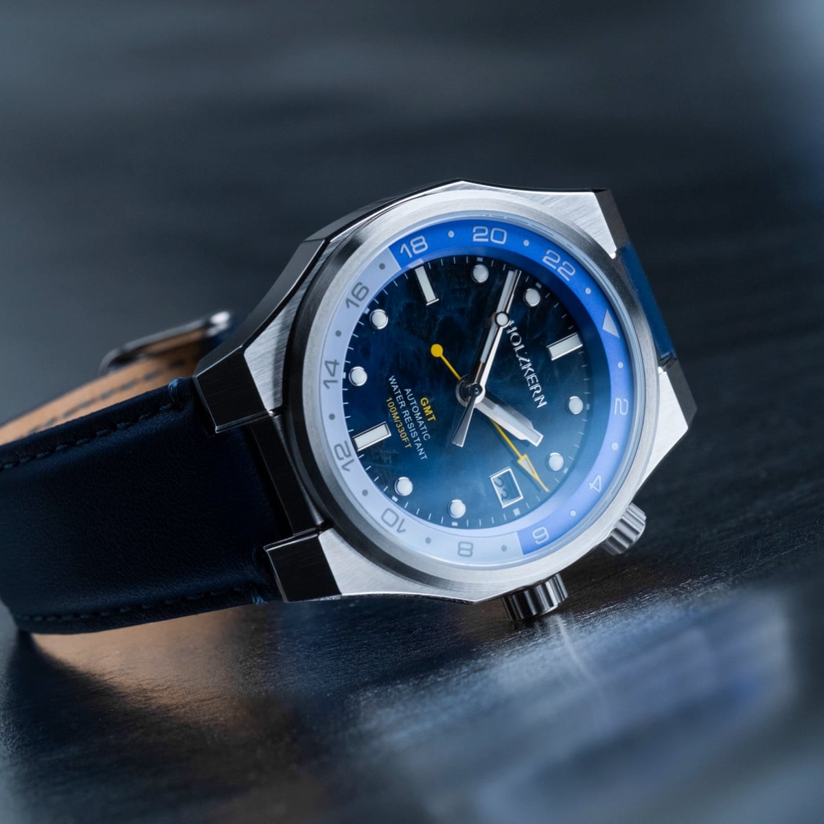"GMT Cloudhopper", a stylish watch with a marble and blue design.