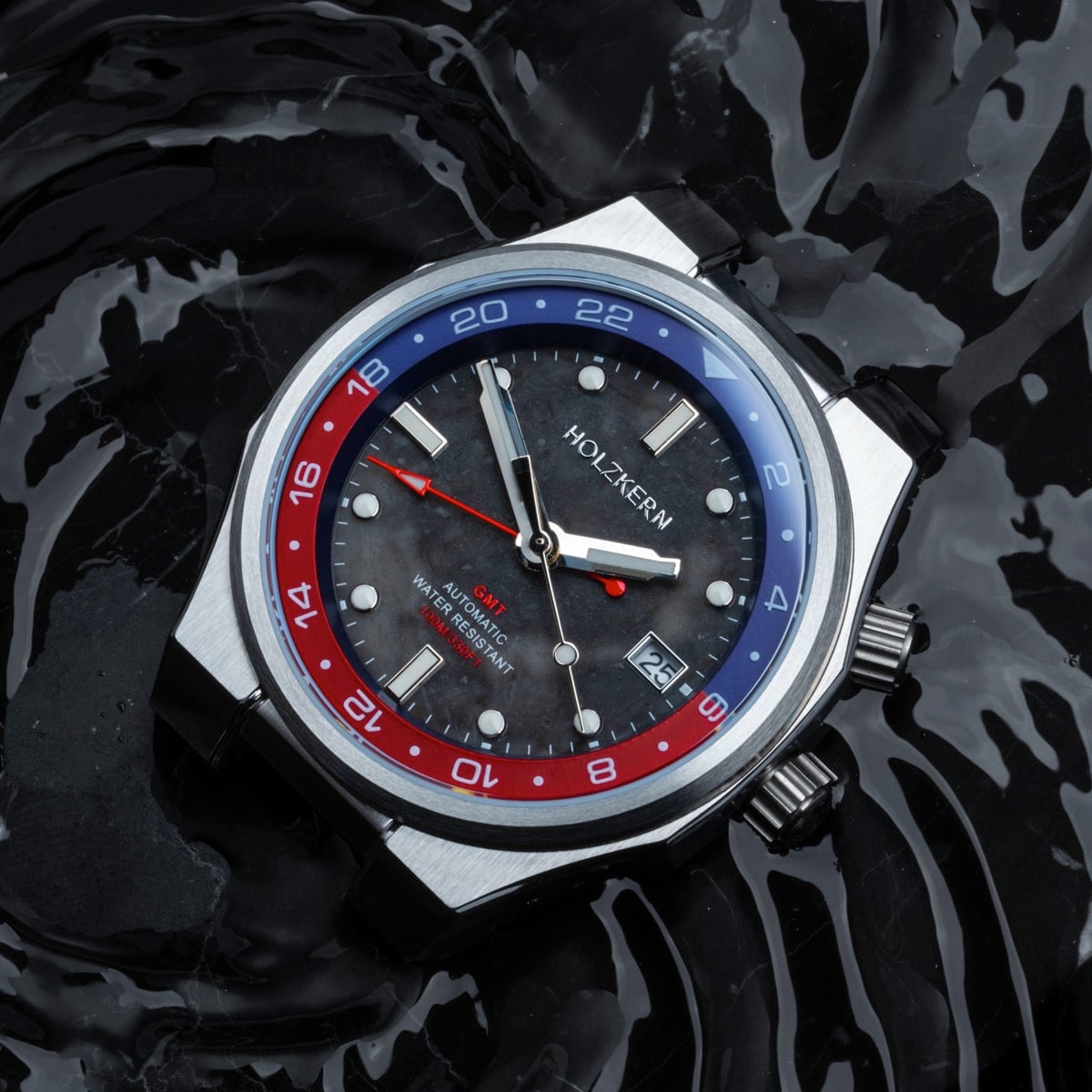 "GMT Cloudhopper" watch with a marble/black face and vibrant colors, featuring a GMT design on a stylish backdrop.