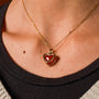 "Amorance Necklace" necklace with a heart-shaped pendent, featuring chalcedony and gold for an elegant, sophisticated look.