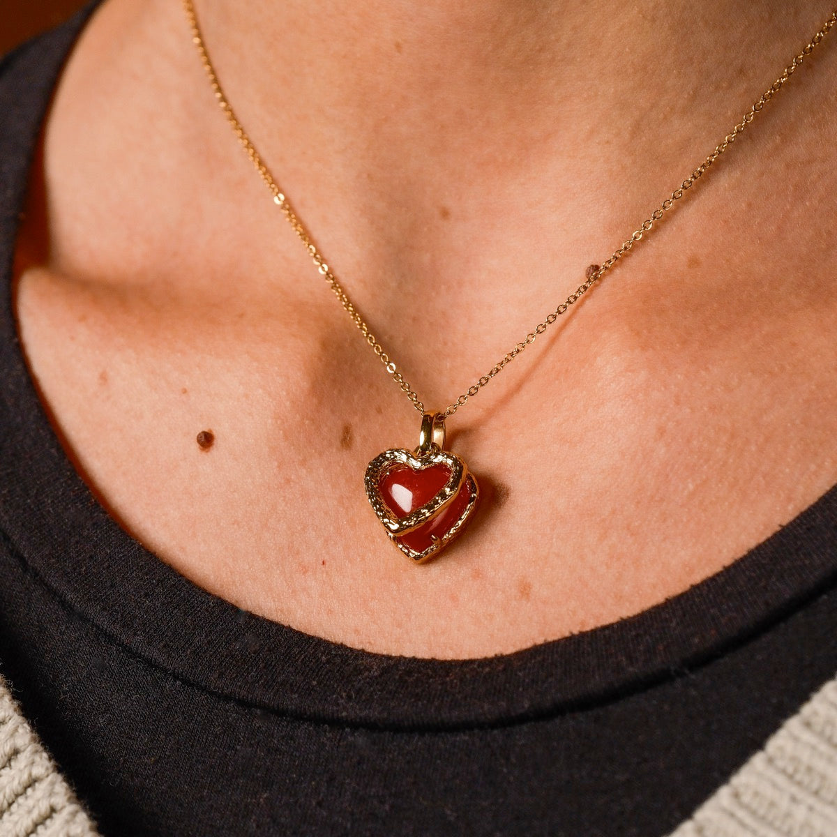 "Amorance Necklace" necklace with a heart-shaped pendent, featuring chalcedony and gold for an elegant, sophisticated look.