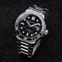 "Deepdiver" watch featuring a sleek marble and silver design with a durable strap.