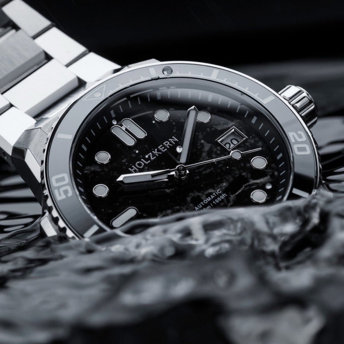 "Deepdiver" diving watch combining marble and silver with a sleek, modern aesthetic.