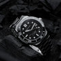 "Deepdiver" watch in marble and silver design, featuring a sleek and modern aesthetic.