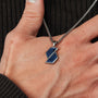 "Baritone Necklaces" necklace featuring sodalite and silver in a sleek, geometric design.