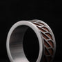 Baritone Rings ring blends elegant walnut wood with sleek silver accents.