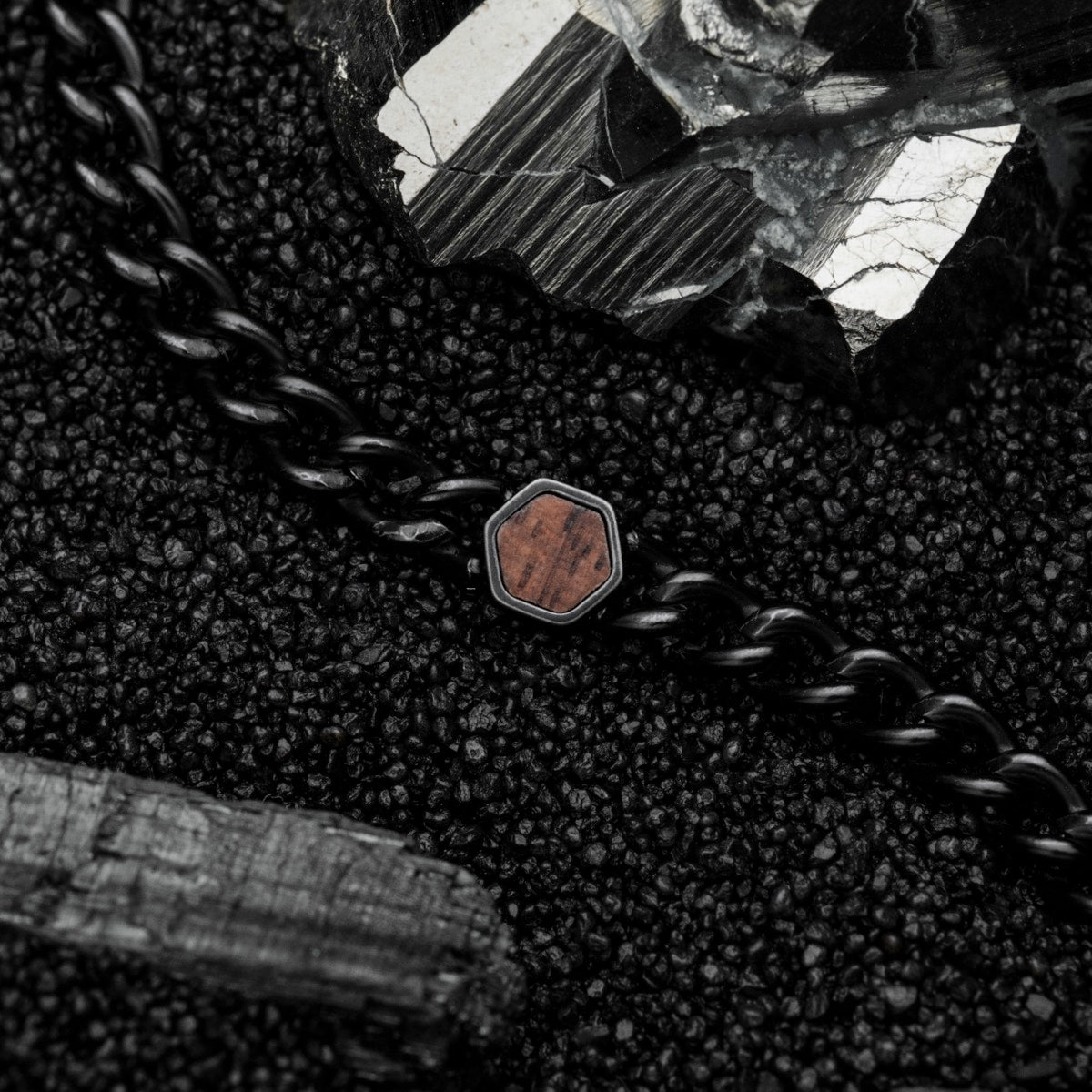 "Bodyguards Necklaces", a necklace featuring walnut and antique silver with a bold and elegant style.