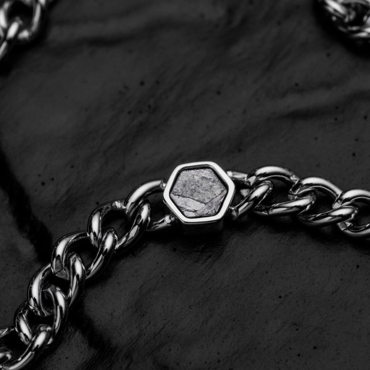 "Bodyguards Necklaces", a stylish necklace blending meteorite and silver materials.