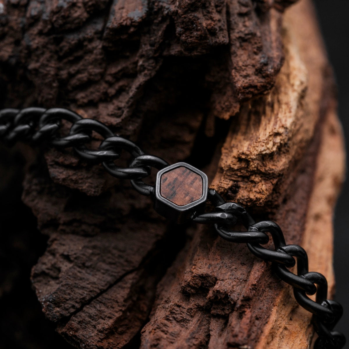 "Bodyguards Necklaces" necklace in walnut and antique silver, featuring a rugged and natural style.