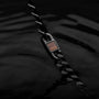 "Bodyguards Necklaces" necklace featuring walnut and dark gray materials in a sleek, modern style.