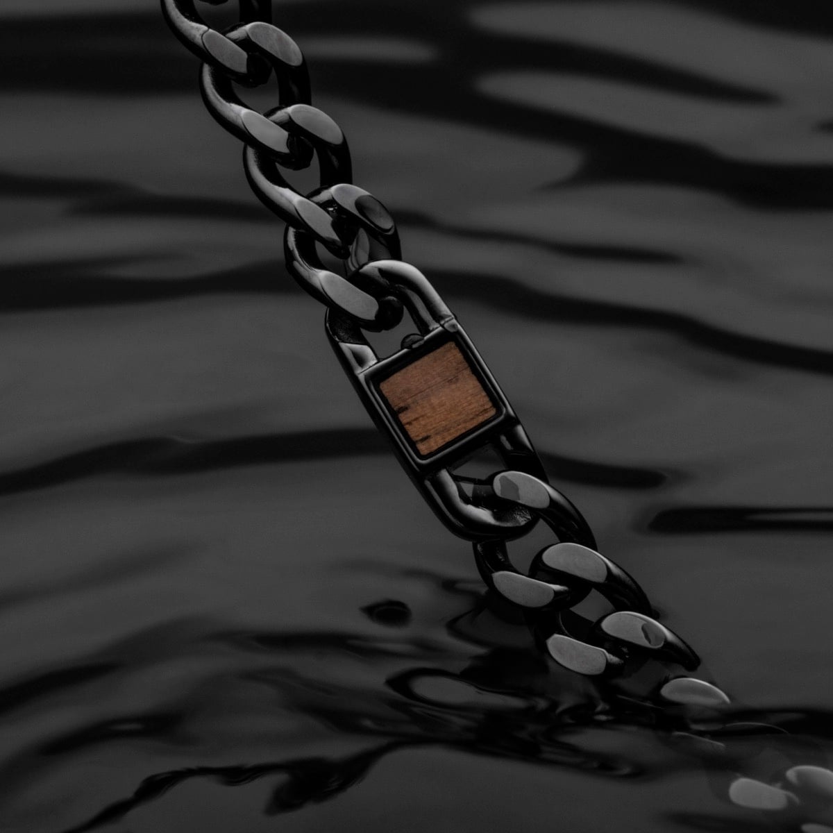 "Bodyguards Strap" bracelet featuring a sleek design with walnut and dark gray elements.