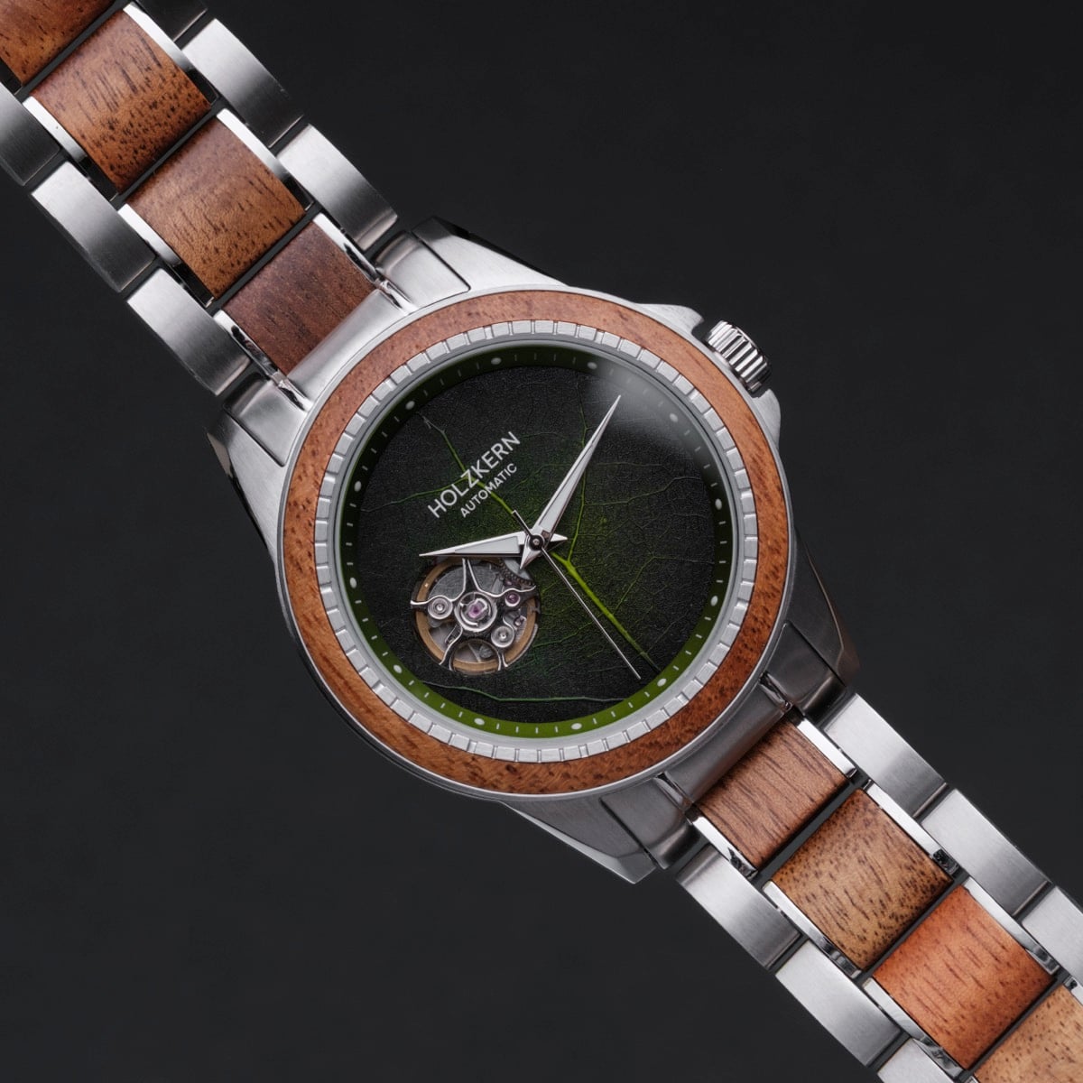 "Whisperwood" watch featuring a koa and leaf design, with a unique blend of wooden and metallic elements.