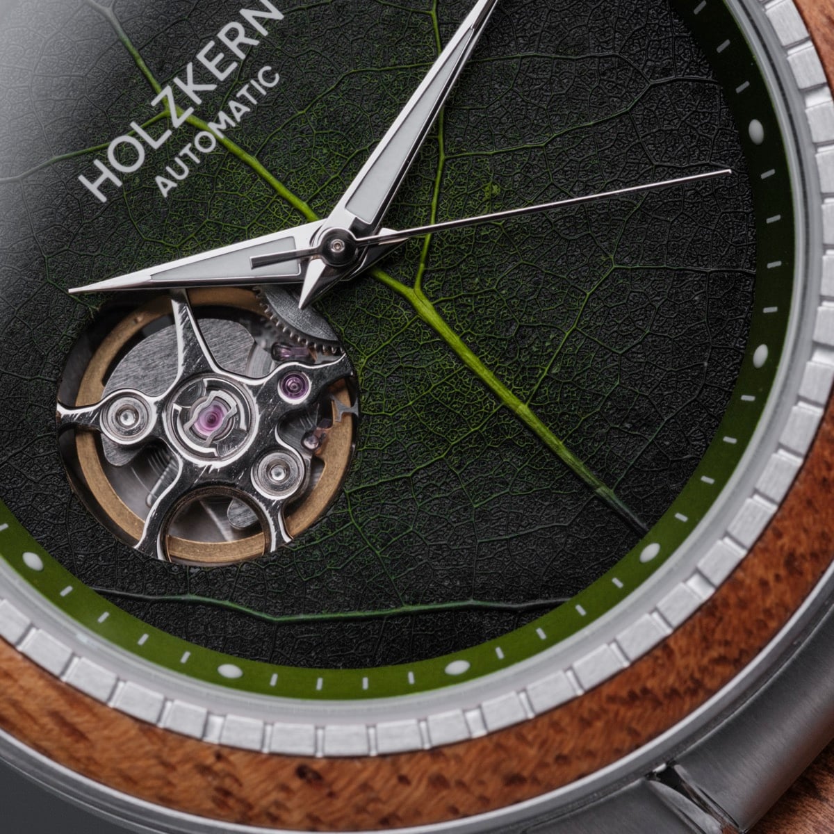 "Whisperwood" watch featuring a natural leaf design with koa wood accents.