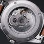 "Whisperwood" watch featuring a stainless steel back and intricate mechanical design with wooden accents.