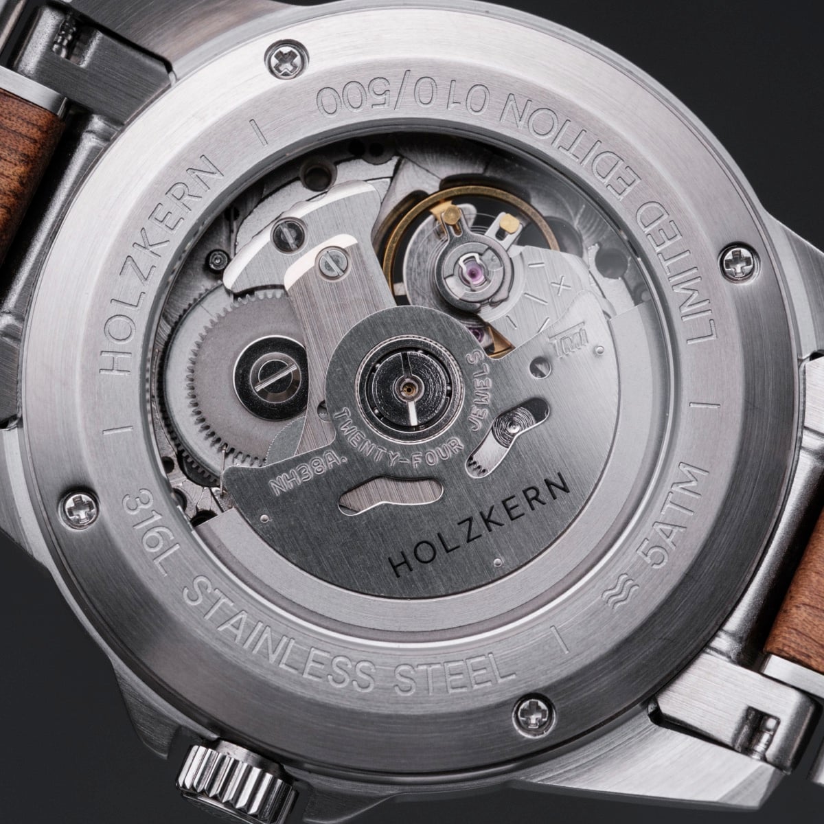"Whisperwood" watch featuring a stainless steel back and intricate mechanical design with wooden accents.