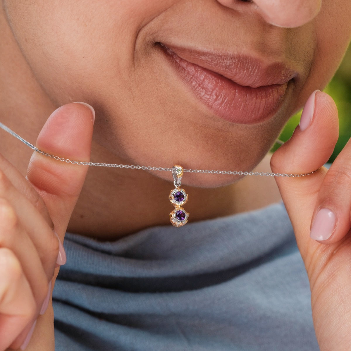 "Silverstream Necklace": a delicate necklace featuring amethyst gemstones with a gold setting for an elegant touch.