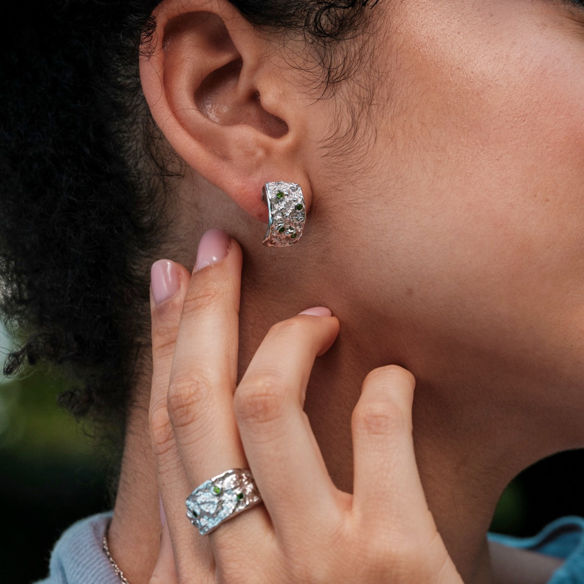 Silverstream earrings, elegantly crafted with diopside and silver, featuring a textured, modern aesthetic.