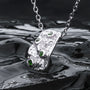 "Silverstream Necklace, a striking necklace with green diopside and silver design, set against a flowing water-inspired background."