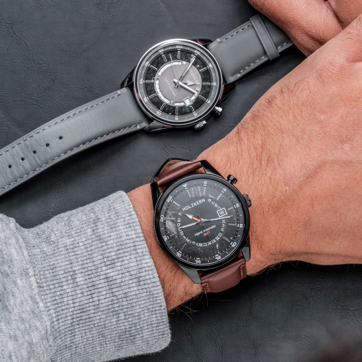 "Gmt Skywhirl" watch featuring a marble and black design with a sophisticated style.