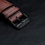 Gmt Skywhirl Leather strap in marble black style with polished buckle.