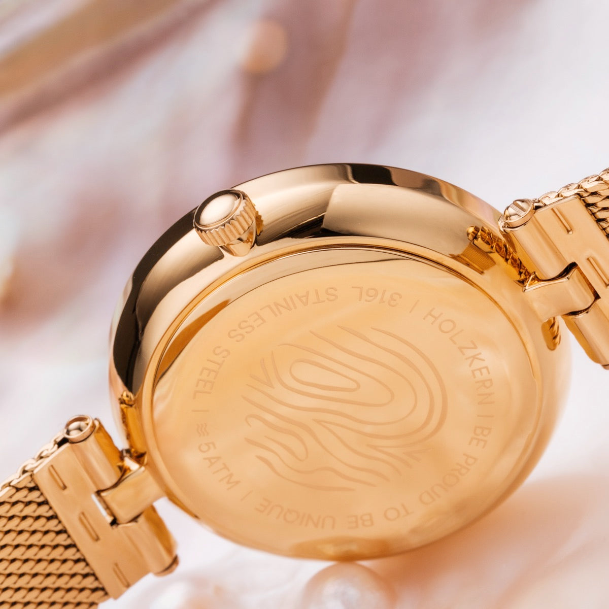 "Everbloom" watch featuring a gold stainless steel casing and elegant design.