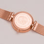"Everbloom" watch in rose gold with plum blossom motif, elegant design.