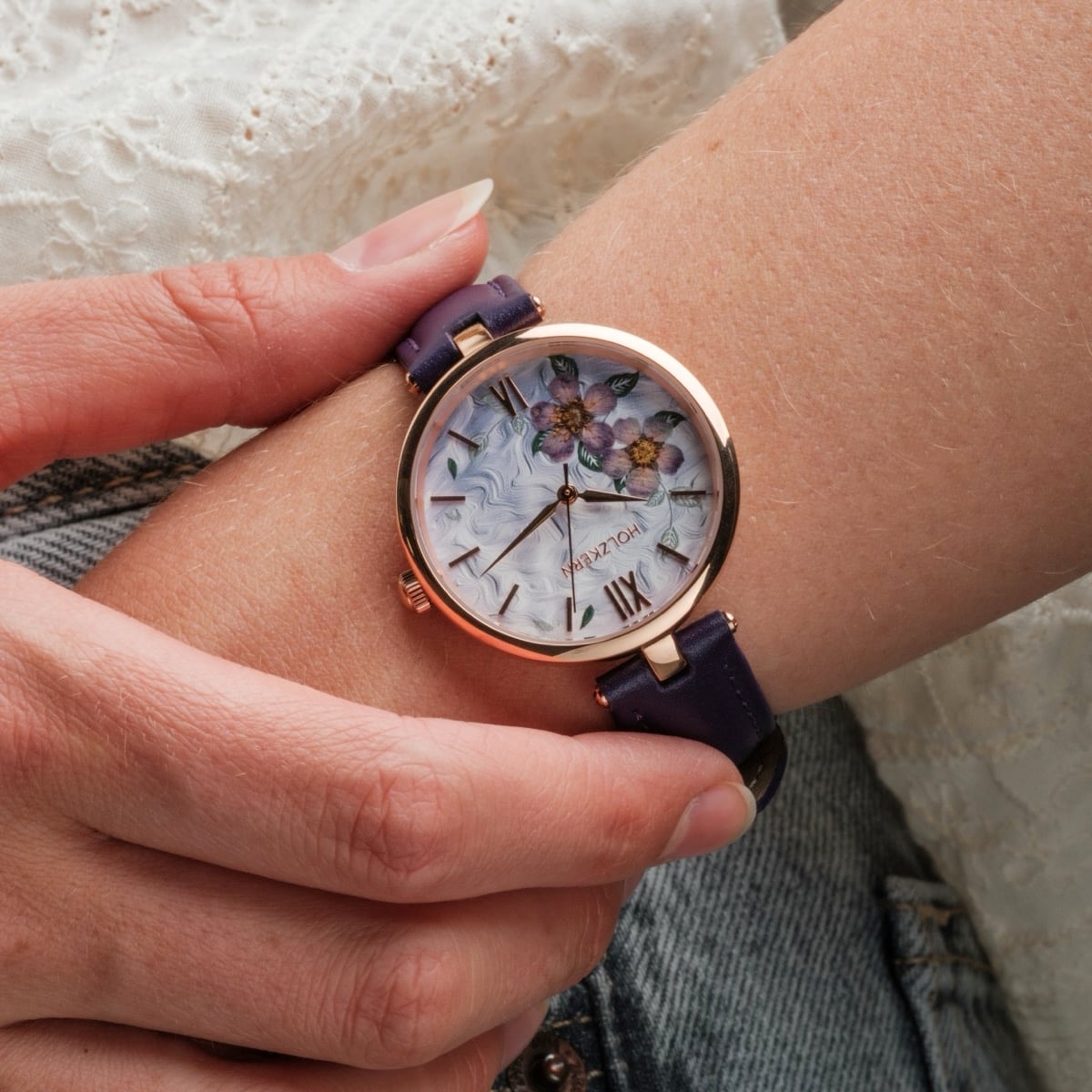 "Everbloom" watch showcases a floral dial with a plum and violet color scheme, exuding elegance and style.