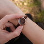 "Shirin" watch featuring a walnut dial and rose gold accents with a sophisticated, minimalist design.
