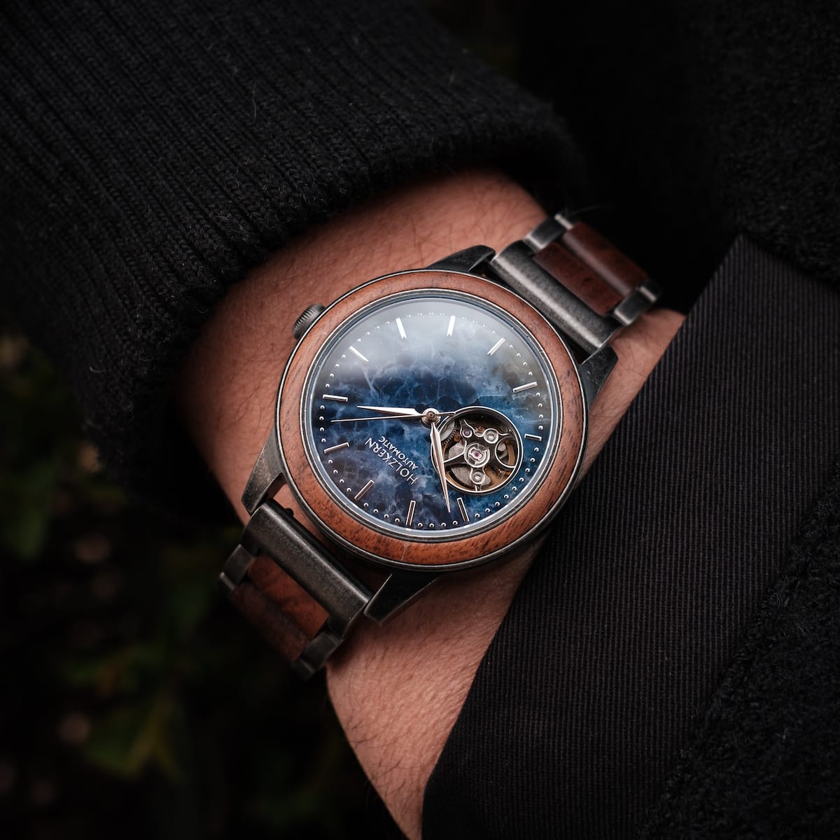 "Alrakis" watch, featuring a walnut and marble design for a sleek, sophisticated look.