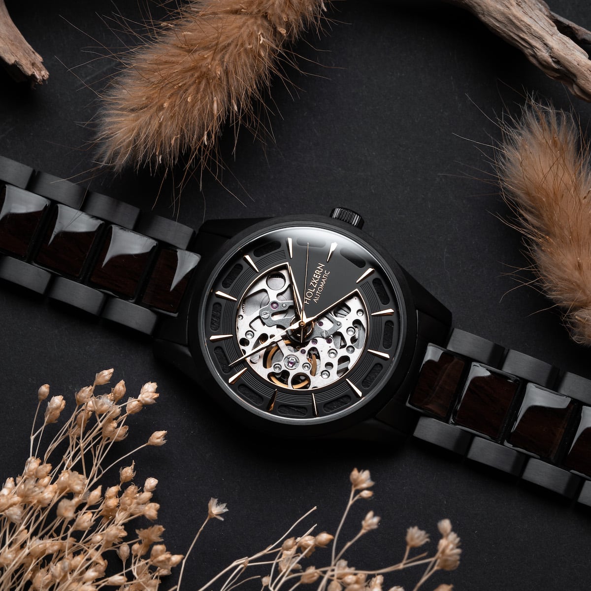 "Woodleigh" watch featuring a sophisticated maple and black design with a striking open dial.