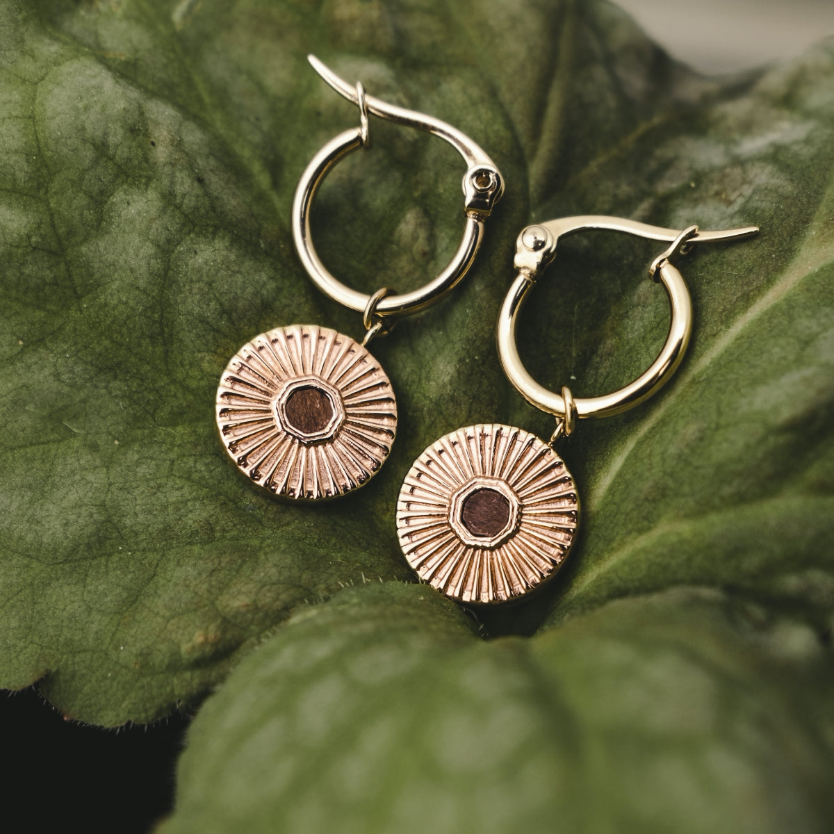 Stencil earrings, stylish earrings in walnut and rose gold with a delicate, intricate design.