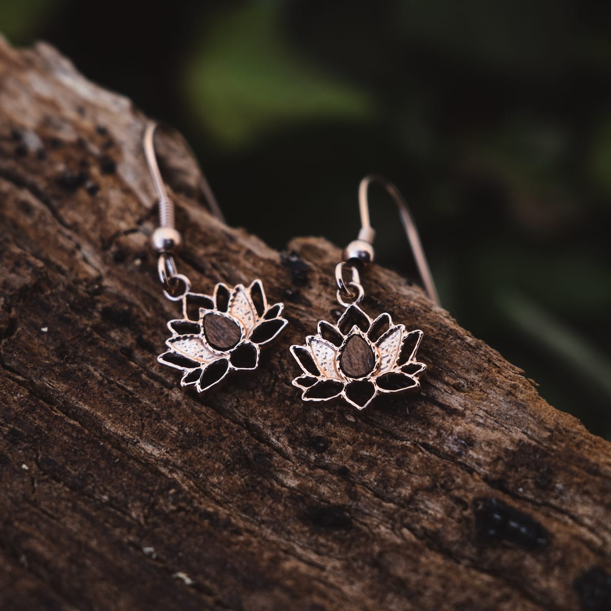 "Balance Earrings", elegant rose gold and walnut earrings with delicate floral design.