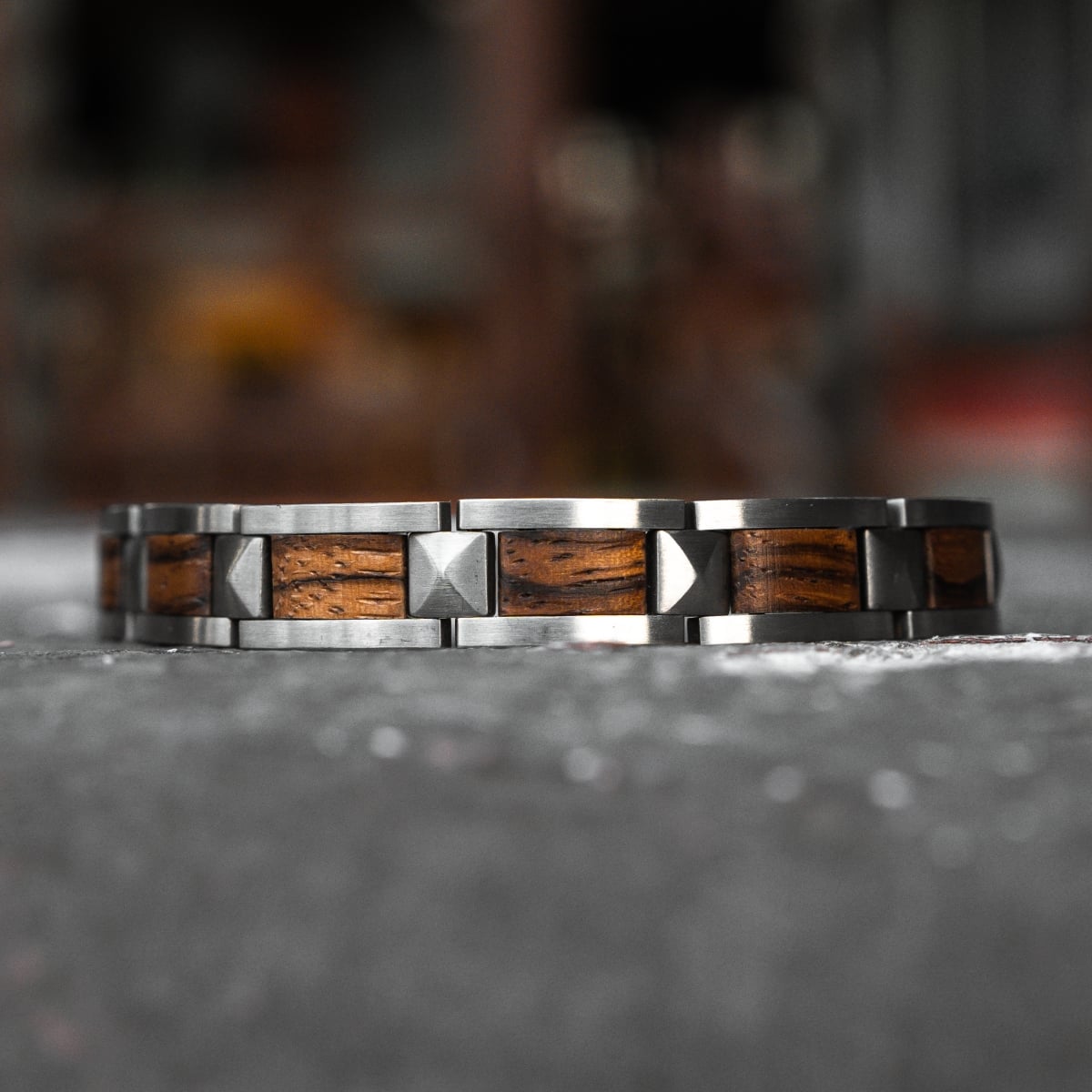 "Rhapsody" bracelet featuring zebrawood and silver for a sleek, modern look.