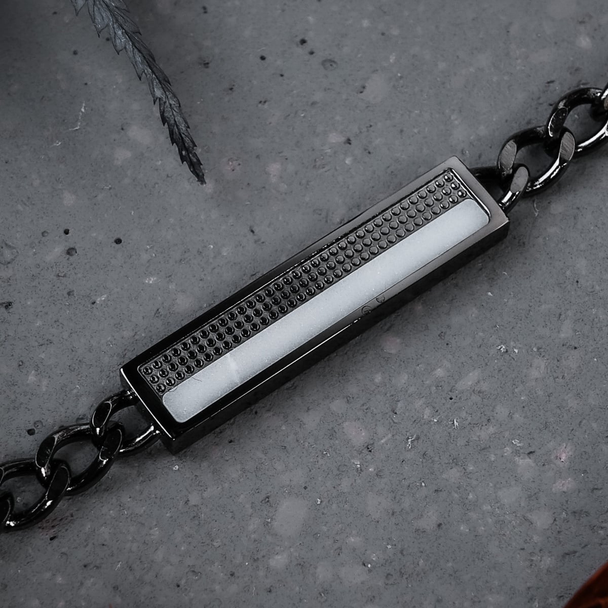 "Planarity Bracelet" bracelet featuring marble and dark grey sleek design.