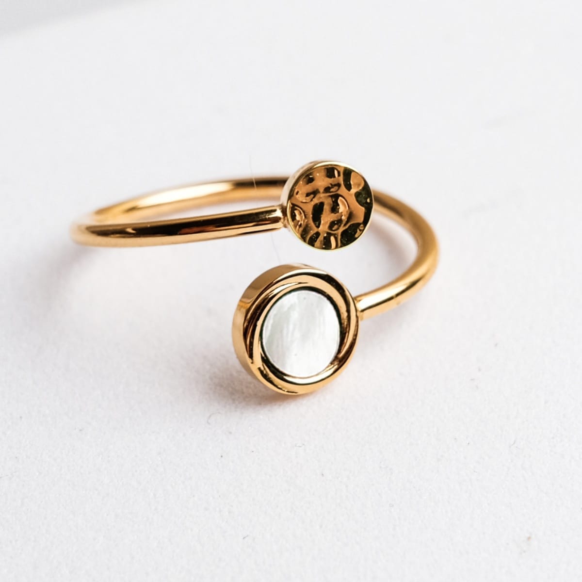 "Zendala Ring" - elegant gold ring with white nacre accents.