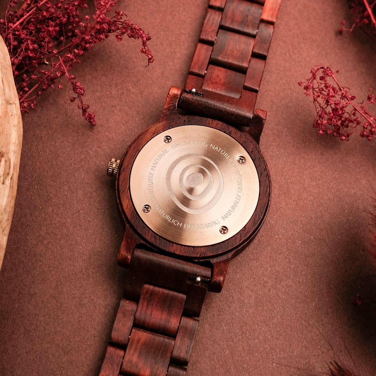 "Passion", wooden wristwatch, crafted with a distinct Padauk and Maple design, showcasing a rich, natural aesthetic.